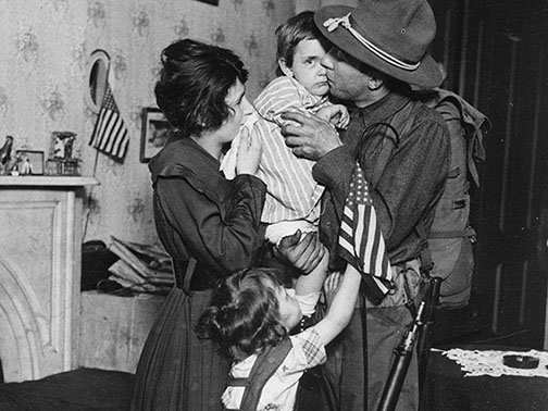 Private T. P. Loughlin of the 69th Regiment, New York National Guard, (165th Infantry) bidding his family farewell.