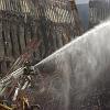 Firefighters continue to extinguish smoldering fire at Ground Zero.