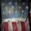Recovered, but severely damaged, one of the several American flags from the World Trade Center.